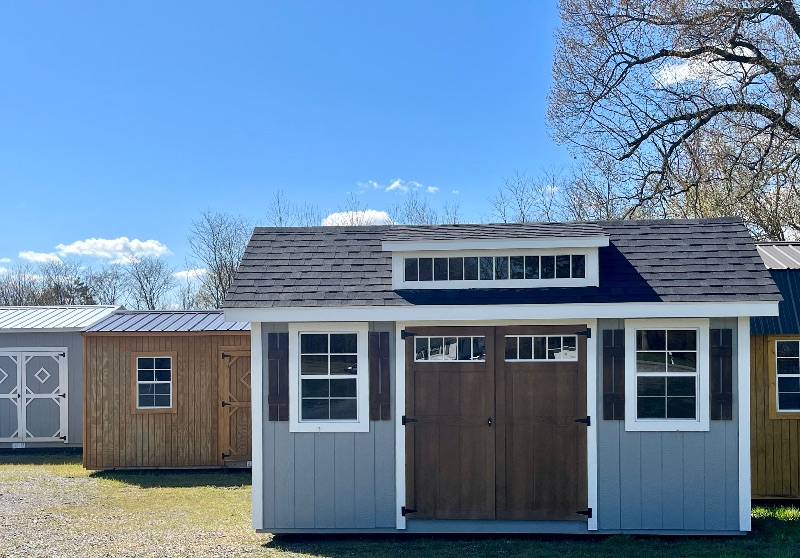 Gambrel shed with transom window for hunting camp.