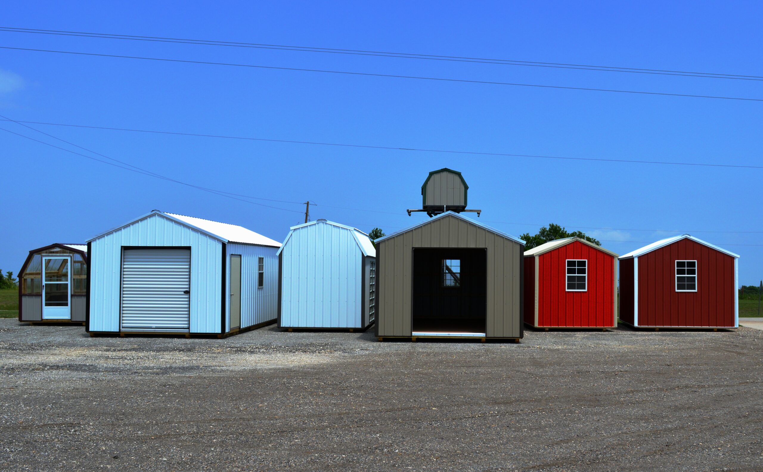 Variety of storage sheds for hunting camp use.