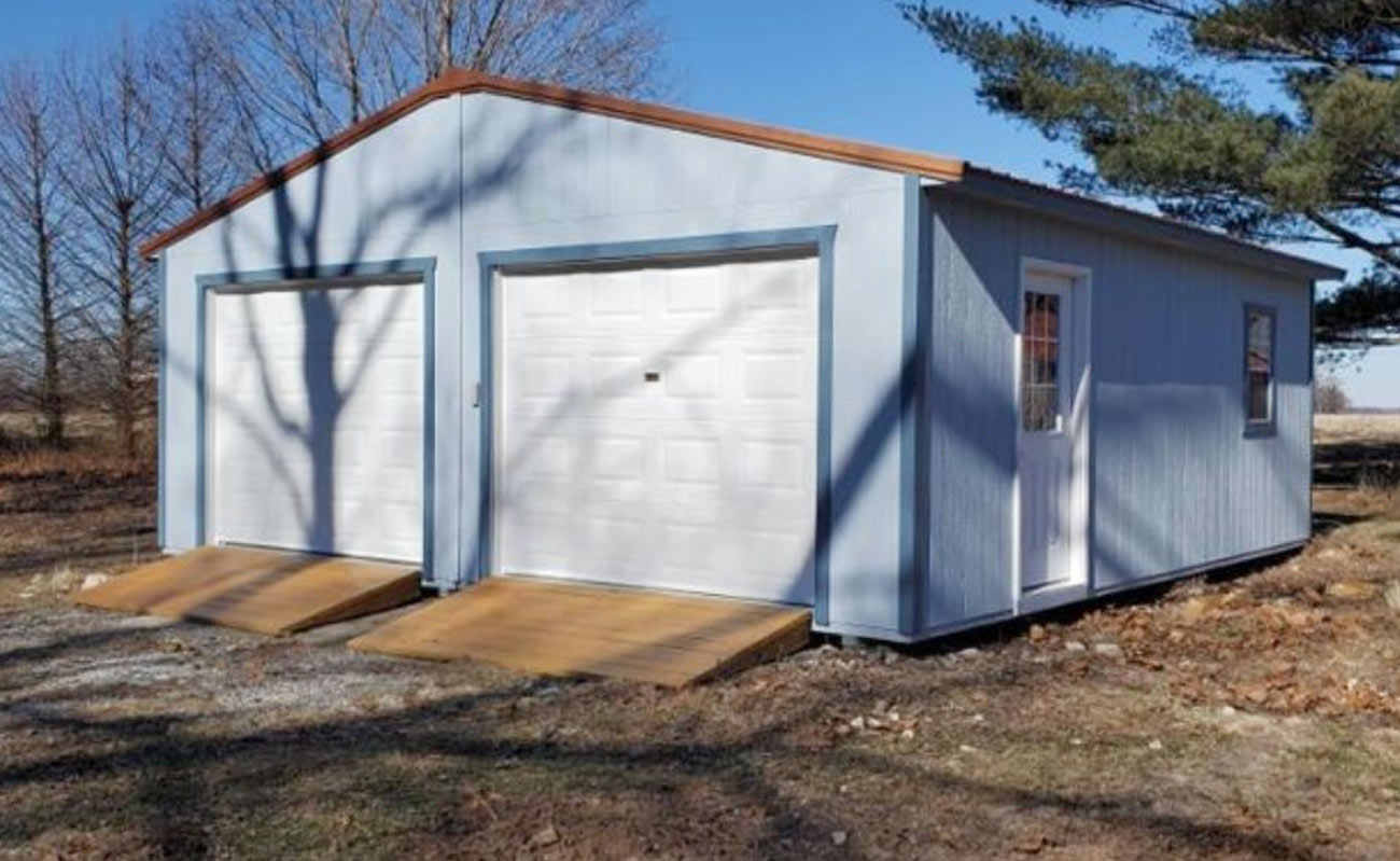 Using a garage shed for a portable hunting camp shed.