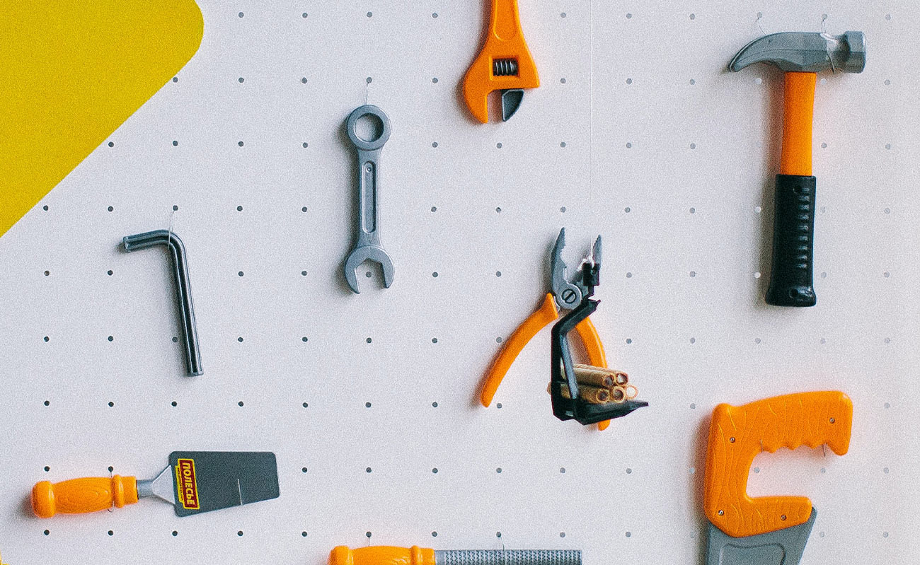 Tools on pegboard for shed storage