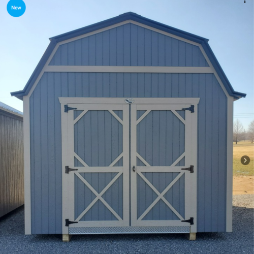 Blue shed with white trim from Ozark Portable Buildings