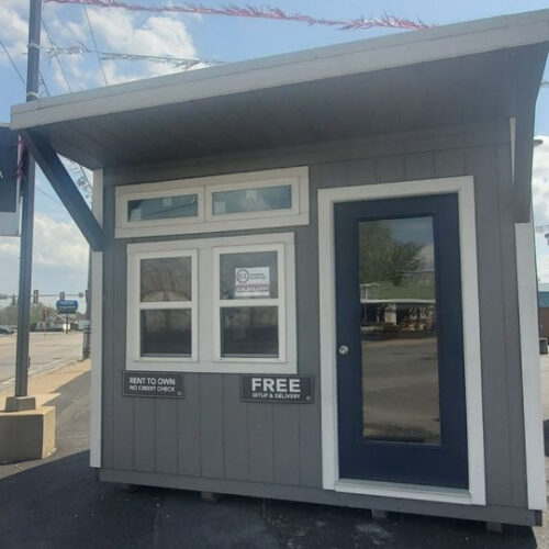 Gray sloped roof shed with white trim from ez portable buildings